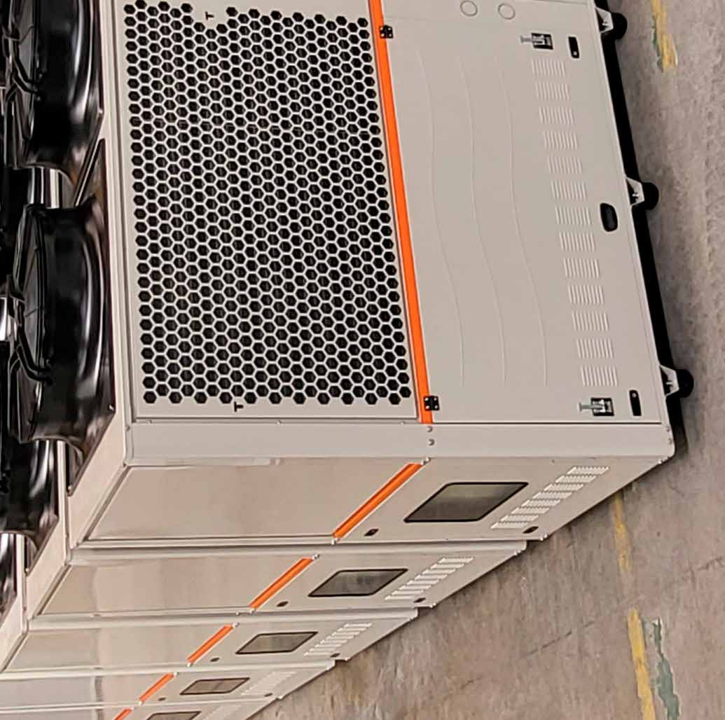 Industrial air-cooled units on the production floor