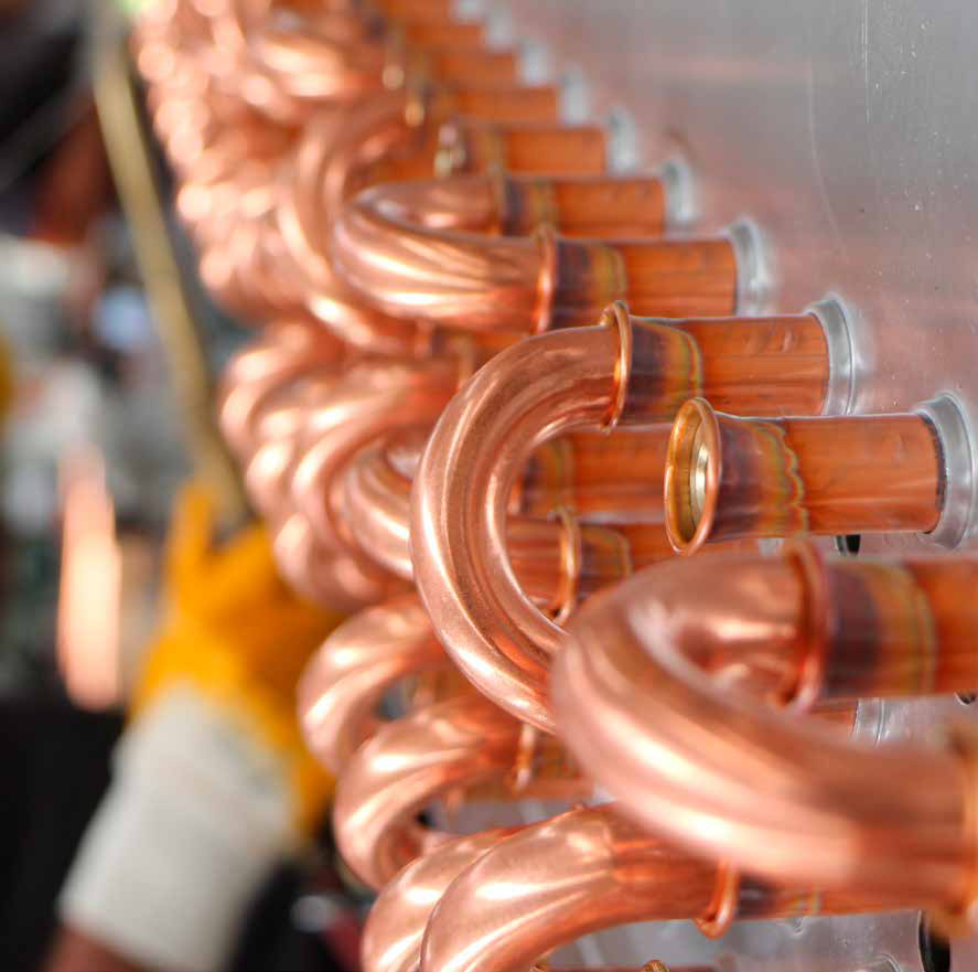Copper return bends on a heat exchanger assembly